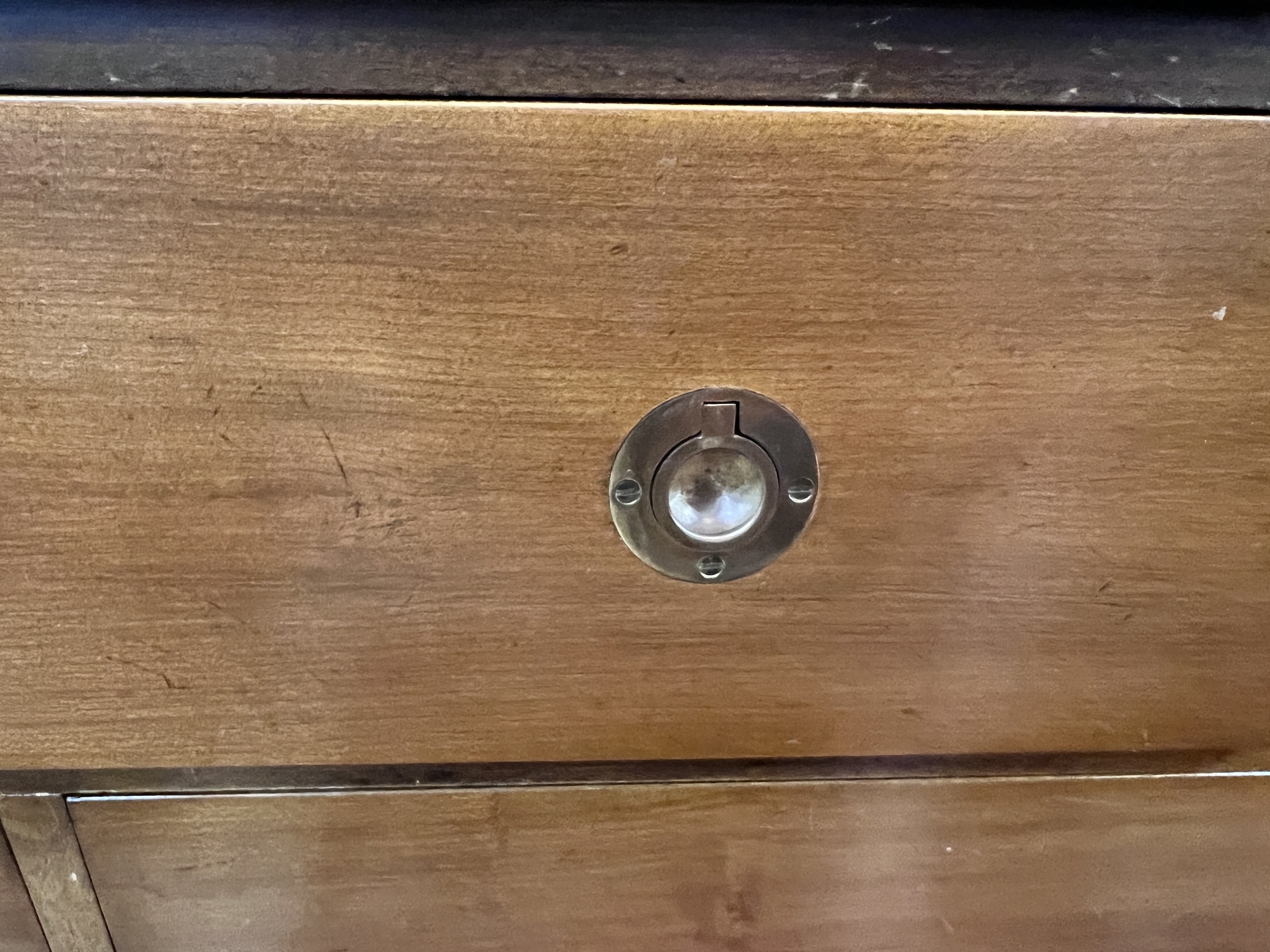 A reproduction mahogany military style dresser fitted seven small drawers, with recessed brass handles, width 153cm, depth 48cm, height 74cm